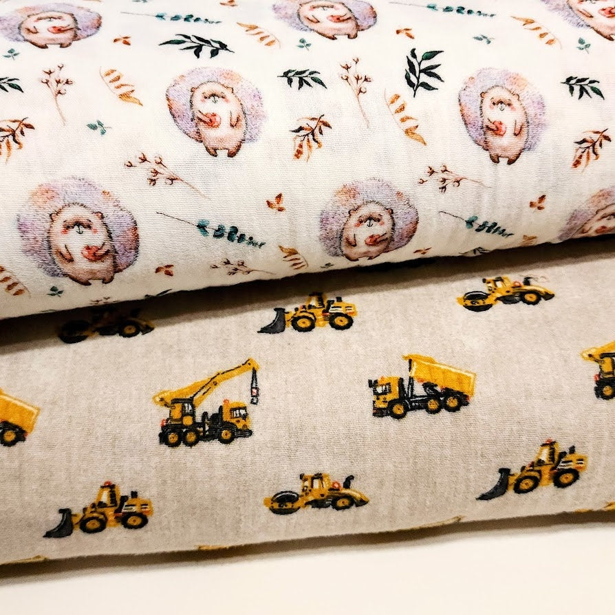 Cotton Double Gauze Muslin Fabric. Cute Hedgehog or Construction Trucks. Soft Fabric and Nice Quality European Fabric. Sold by the 1/2 yard.