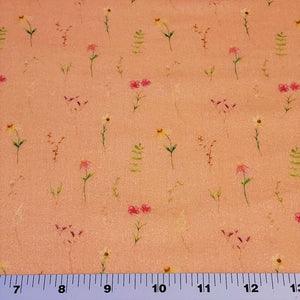 100% Cotton Double Gauze Muslin Fabric with Dainty Floral prints on Peach Gauze. Nice Quality soft European Fabric. Sold by the 1/2 yard.