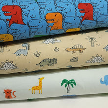 Load image into Gallery viewer, Dinosaur Cotton Spandex European Knit Fabric, Colorful T Rex Dino Fabric, Nice Quality Soft Fabric, 4-way Stretch. Sold by the 1/2 yard.
