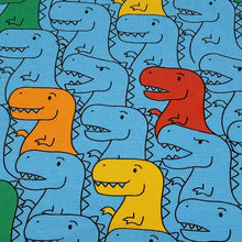 Load image into Gallery viewer, Dinosaur Cotton Spandex European Knit Fabric, Colorful T Rex Dino Fabric, Nice Quality Soft Fabric, 4-way Stretch. Sold by the 1/2 yard.
