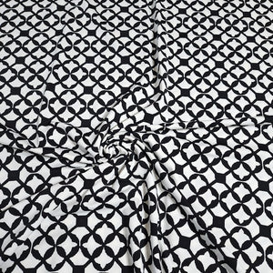 SWIM Fabric: Nylon Spandex Knit, Swimwear Fabric, Stylish Black and White Print. Very Nice For Swimsuit and Activewear. Sold by the 1/2 yard