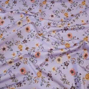 Cotton Jersey Knit Purple Lilac Floral. Cotton Spandex Euro Knit Fabric. Nice Quality Soft Fabric, 4-way Stretch. Sold by the 1/2 yard.