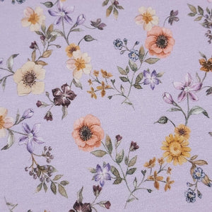 Cotton Jersey Knit Purple Lilac Floral. Cotton Spandex Euro Knit Fabric. Nice Quality Soft Fabric, 4-way Stretch. Sold by the 1/2 yard.