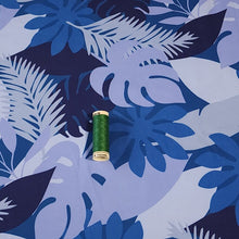 Load image into Gallery viewer, SWIM Fabric: Nylon Spandex Knit, Tropical Leaf Pattern in Varigated Blue. Very Nice Quality Activewear and Swim Fabric. Sold by the 1/2 yard
