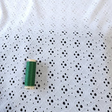 Load image into Gallery viewer, White Eyelet Poly Spandex Knit Fabric, Stretch Knit Fabric, 55 inches Wide. Ideal for Apparel and Home Decor. Sold by the 1/2 yard.
