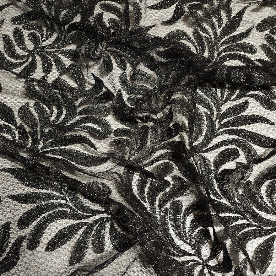 Beautiful Black Glittery Lace leaves on Gray Fishnet Lace, Unique and Trendy Lace, Ideal for Apparel and Home Decor. Sold by the 1/2 yard.