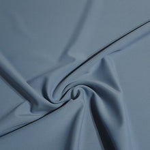 Load image into Gallery viewer, Swim Fabric, Dusty Blue Solid Swim. Nice feel and quality, Pretty Nylon Spandex, Perfect for swimwear, activewear. Sold by the 1/2 yard
