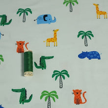 Load image into Gallery viewer, Jungle Print Cotton Jersey Knit Fabric, Giraffe, Crocodile, and Hippo Fabric on Mint. European Sourced, 4-way Stretch. Sold by the 1/2 yard.
