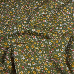 Rayon Crepe Fabric, Green with Yellow and White Ditsy Floral Print. Light and Flowy Fabric. 100% Rayon Woven Fabric. Sold by the 1/2 yard