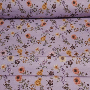 Cotton Jersey Knit Purple Lilac Floral. Cotton Spandex Euro Knit Fabric. Nice Quality Soft Fabric, 4-way Stretch. Sold by the 1/2 yard.