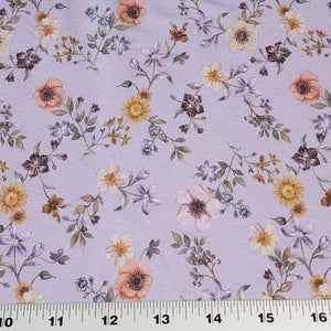 Cotton Jersey Knit Purple Lilac Floral. Cotton Spandex Euro Knit Fabric. Nice Quality Soft Fabric, 4-way Stretch. Sold by the 1/2 yard.