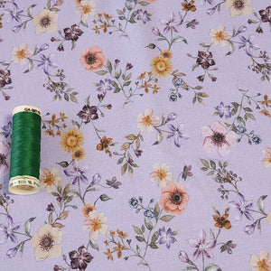 Cotton Jersey Knit Purple Lilac Floral. Cotton Spandex Euro Knit Fabric. Nice Quality Soft Fabric, 4-way Stretch. Sold by the 1/2 yard.