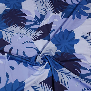 SWIM Fabric: Nylon Spandex Knit, Tropical Leaf Pattern in Varigated Blue. Very Nice Quality Activewear and Swim Fabric. Sold by the 1/2 yard