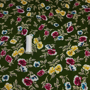 Rayon Challis Fabric, Green Challis With a Sweet Yellow Floral Print. Light and Flowy Fabric. 100% Rayon Woven Fabric. Sold by the 1/2 yard