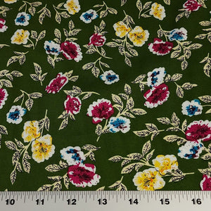 Rayon Challis Fabric, Green Challis With a Sweet Yellow Floral Print. Light and Flowy Fabric. 100% Rayon Woven Fabric. Sold by the 1/2 yard