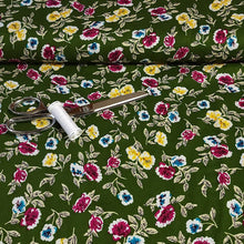 Load image into Gallery viewer, Rayon Challis Fabric, Green Challis With a Sweet Yellow Floral Print. Light and Flowy Fabric. 100% Rayon Woven Fabric. Sold by the 1/2 yard
