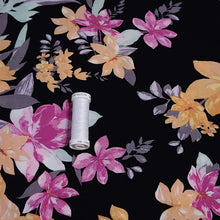 Load image into Gallery viewer, Rayon Challis Fabric, Black Challis with Yellow Tropical Floral Print. Light and Flowy Fabric. 100% Rayon Woven Fabric. Sold by the 1/2 yard
