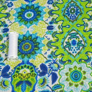 Rayon Challis Fabric, Fun Green and Blue Summer Boho Design . Light and Flowy Fabric. 100% Rayon Woven Fabric. Sold by the 1/2 yard