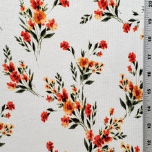 Load image into Gallery viewer, Ribbed Knit Stretch Fabric. 4 way stretch. Very Pretty Ivory with Orange and Green floral print. Fabric is sold by the 1/2 Yard .
