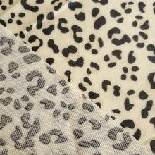 Load image into Gallery viewer, French Terry Stretch Knit Fabric, Cream/Gray Leopard Cheetah Print, Poly Rayon Spandex Tri Blend.  2-way stretch. Sold by the 1/2 yard
