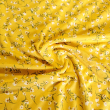 Load image into Gallery viewer, Double Brushed Poly, White floral print on Yellow, DBP Knit Fabric. Very Pretty and So Soft, 4-Way Stretch, Sold by the 1/2 yard
