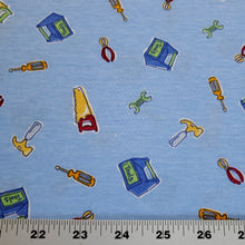 Load image into Gallery viewer, Cotton Blend Stretch Knit T-Shirt Fabric, Construction Tools on Blue, Great for T-shirts and more. 2-way stretch. Sold by the 1/2 yard
