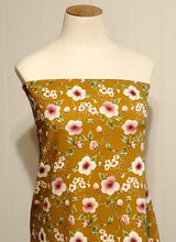 Load image into Gallery viewer, Organic Cotton Spandex French Terry Euro Knit: Pretty Floral on Curry Yellow, Nice Quality Soft Fabric, 4-way stretch. Sold by the 1/2 yard.
