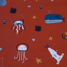 Load image into Gallery viewer, Organic Cotton Spandex Euro Knit Fabric: Snorkeling Sea Life on Brick Red, Nice Quality Soft Fabric, 4-way stretch. Sold by the 1/2 yard.
