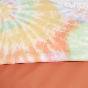 Swimwear Fabric: Nylon Spandex Knit, Fun Boho Rainbow Pastel Tie Dye Print . Nice Quality and Fun Swim Fabric. Sold by the 1/2 yard