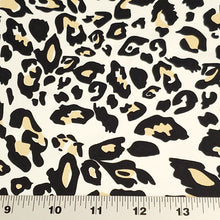 Load image into Gallery viewer, SWIM Fabric: Nylon Spandex Knit, Fun Black, Beige, and White Cheetah Print. Very Nice Quality Activewear and Swimwear. Sold by the 1/2 yard
