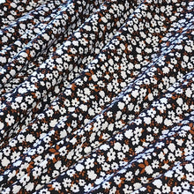 Load image into Gallery viewer, Double Brushed Polyester Knit Fabric, DBP, 4-Way Stretch, Black with White and Rust Dainty Floral, Soft and Versatile, Sold by the 1/2 yard
