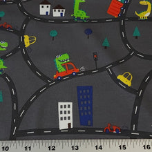 Load image into Gallery viewer, European Knit Fabric, Dinosaurs in the City in Trucks and Cars, 4-way stretch Cotton Spandex jersey knit, Sold by the 1/2 yard.
