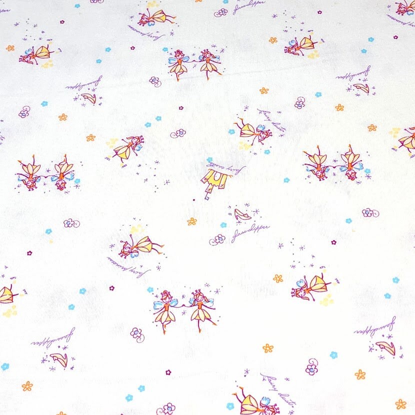 Spandex Blend Knit Fabric, 4-Way Stretch, Cute Fairies and Castle Print on Cream. Cute and So Comfortable, Sold by the 1/2 yard