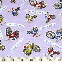 Load image into Gallery viewer, Cotton Jersey T-Shirt Knit, Bike Fabric with Bicycles and Tricycle on Lavendar Background. 2-way stretch. Sold by the 1/2 yard
