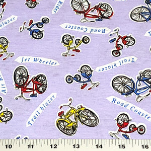 Cotton Jersey T-Shirt Knit, Bike Fabric with Bicycles and Tricycle on Lavendar Background. 2-way stretch. Sold by the 1/2 yard