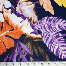 Load image into Gallery viewer, Lightweight Cotton Knit Fabric, Pretty Purple, Coral, and Yellow Tropical Print on Navy. 2-way stretch. Sold by the 1/2 yard
