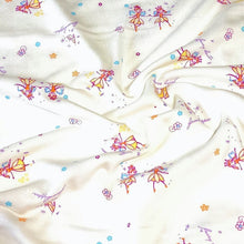 Load image into Gallery viewer, Spandex Blend Knit Fabric, 4-Way Stretch, Cute Fairies and Castle Print on Cream. Cute and So Comfortable, Sold by the 1/2 yard
