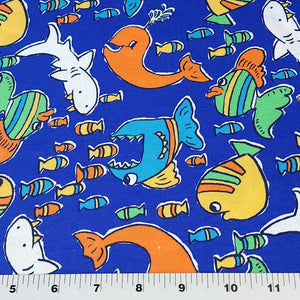 Cotton T-Shirt Stretch Knit Fabric, Colorful Whales, Sharks, and Fish. Lightweight 2-Way Stretch Cotton Blend Fabric. Sold by the 1/2 yard