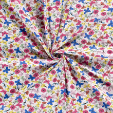 Load image into Gallery viewer, Cotton Spandex European Knit Fabric, Fun Butterflies and Flowers Fabric. Nice Quality Soft Fabric, 4-way Stretch. Sold by the 1/2 yard.
