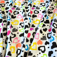 Load image into Gallery viewer, Fun Colorful Heart Knit Fabric. Cotton Blend T-Shirt Knit. Cute Fabric, Lightweight and Soft 2-way stretch Fabric. Sold by the 1/2 yard
