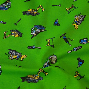 Cotton Spandex Stretch Knit Jersey Fabric, Construction Trucks on Green, Fun and Durable 4-way stretch Fabric.  Sold by the 1/2 yard