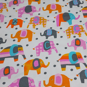 Cotton Spandex Stretch Knit Jersey Fabric, Playful and Colorful Elephant Fabric, Fun and Durable 4-way stretch Fabric.  Sold by the 1/2 yard