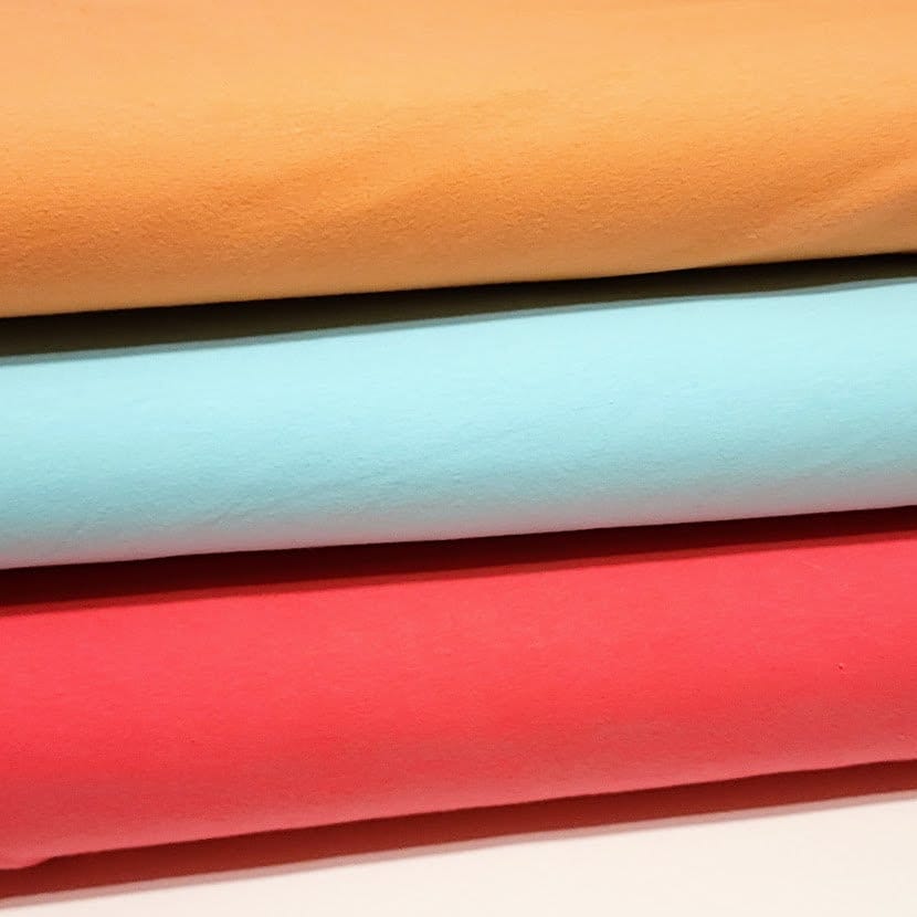 Cotton Spandex Fabric, Fun Pretty Cotton Spandex Solids. Very Nice Mid-Weight Fabric. 64 Inches Wide, 4-Way Stretch. Sold by the 1/2 yard