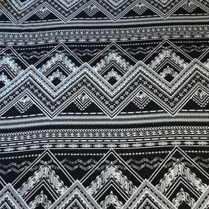 Rayon Challis Fabric. Black and White Boho Print. A Very Nice Light and Flowing Fabric. Nice Rayon Woven Fabric. Sold by the 1/2 yard