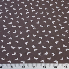 Load image into Gallery viewer, Butterfly fabric on Dusty Brown, Cotton Spandex Euro Knit Fabric, Fun and Soft Fabric, Quality Fabric, 4-way Stretch. Sold by the 1/2 yard.
