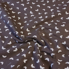 Load image into Gallery viewer, Butterfly fabric on Dusty Brown, Cotton Spandex Euro Knit Fabric, Fun and Soft Fabric, Quality Fabric, 4-way Stretch. Sold by the 1/2 yard.
