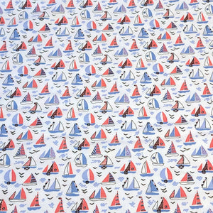 Fun Red, White, and Blue Sail Boats. Cotton Spandex Euro Knit Fabric. Nice Quality Soft Fabric, 4-way Stretch. Sold by the 1/2 yard.