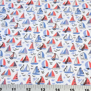 Fun Red, White, and Blue Sail Boats. Cotton Spandex Euro Knit Fabric. Nice Quality Soft Fabric, 4-way Stretch. Sold by the 1/2 yard.