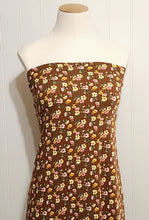 Load image into Gallery viewer, Rib Knit Fabric Brown Rib Knit Fabric with Yellow and Pink Floral Print on Ribbed Poly Spandex 4 Way Stretch Fabric. Sold by the 1/2 Yard.
