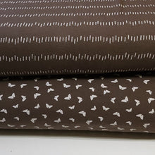 Load image into Gallery viewer, Butterfly fabric on Dusty Brown, Cotton Spandex Euro Knit Fabric, Fun and Soft Fabric, Quality Fabric, 4-way Stretch. Sold by the 1/2 yard.
